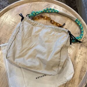 Rotunda Beige Shoulder Bag with Colorful Handle